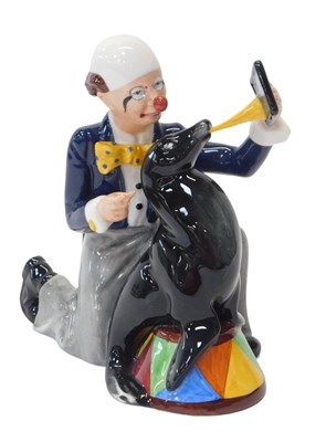 Lot 201 - A Royal Doulton figure modelled as...