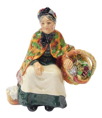 Lot 212 - A Royal Doulton figure modelled as The Old...
