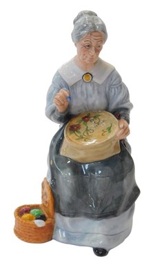 Lot 214 - A Royal Doulton figure modelled as...