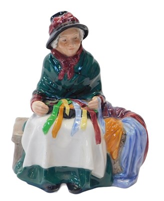 Lot 218 - A Royal Doulton figure modelled as Silks and...