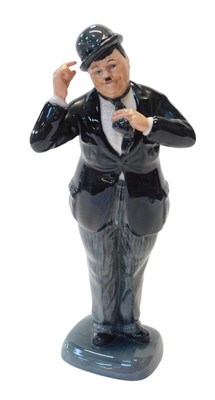 Lot 227 - A Royal Doulton figure modelled as Oliver...