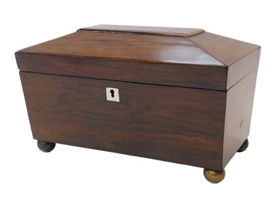 Lot 115 - A Regency rosewood sarcophagus shaped tea...