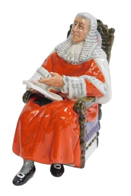 Lot 261 - A Royal Doulton figure modelled as The...