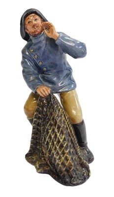 Lot 278 - A Royal Doulton figure modelled as Sea Harvest,...