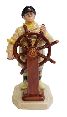 Lot 279 - A Royal Doulton figure modelled as The...