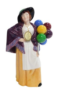 Lot 289 - A Royal Doulton figure modelled as Balloon...