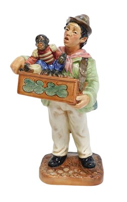 Lot 374 - A Royal Doulton figure modelled as Organ...