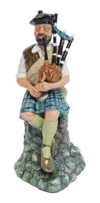 Lot 378 - A Royal Doulton figure modelled as The...