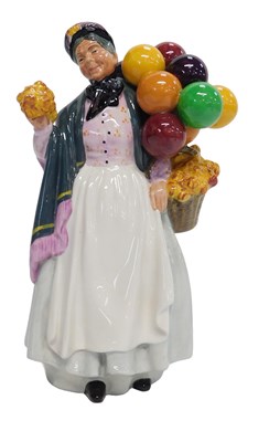 Lot 380 - A Royal Doulton figure modelled as Biddy Penny...