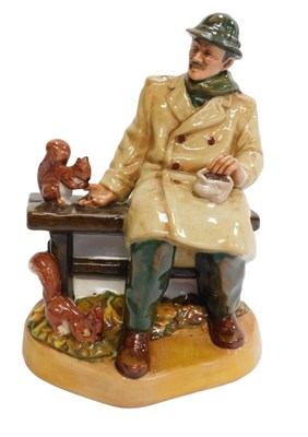 Lot 394 - A Royal Doulton figure modelled as...