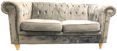 Lot 508 - A grey velvet button back two seater...