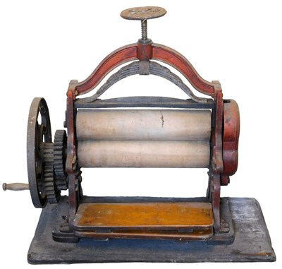 Lot 518 - A Victorian cast iron framed and wooden mangle,...