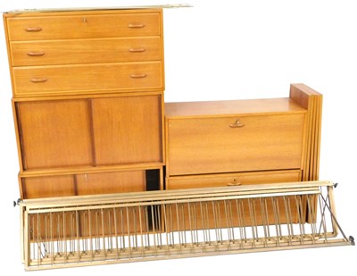 Lot 552 - A mid century Staples Ladderax modular teak...