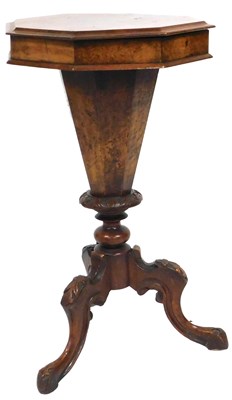 Lot 557 - A Victorian walnut trumpet sewing table, with...