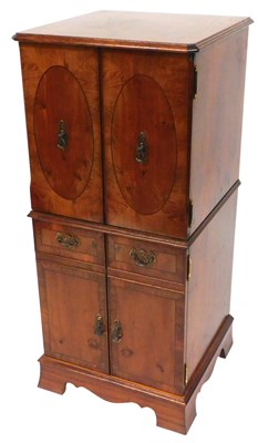 Lot 569 - A Georgian style yew wood hi-fi cabinet, with...