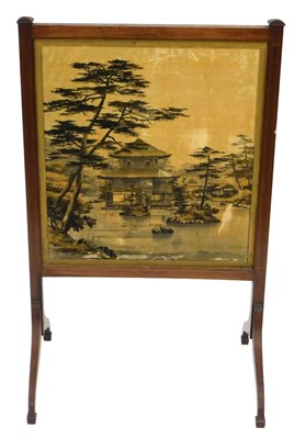 Lot 597 - An Edwardian mahogany fire screen, with...