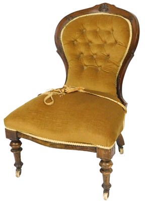 Lot 605 - A Victorian mahogany balloon back nursing...