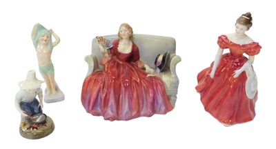 Lot 119 - A group of Royal Doulton figures, comprising...