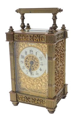 Lot 211 - A 20thC brass cased carriage clock, the...