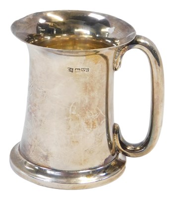 Lot 143 - An Edward VII silver mug, 1903 Chester. with a...