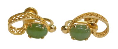 Lot 82 - A pair of costume screw on earrings, each with...