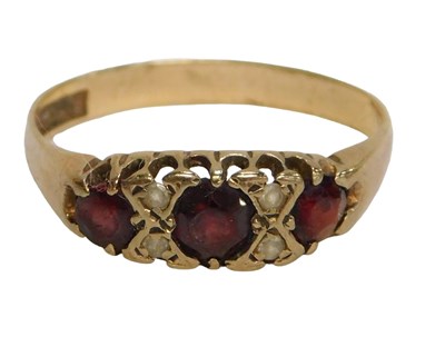 Lot 90 - A 9ct gold garnet and cz set gypsy ring, set...