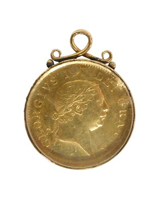 Lot 5 - A George III half guinea coin, mounted in a...