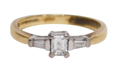 Lot 52 - An 18ct gold diamond dress ring, the...