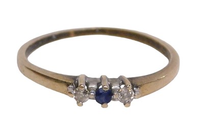 Lot 51 - A 9ct gold sapphire and diamond three stone...