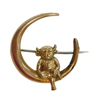 Lot 432 - A 9ct gold crescent brooch, with a Lincoln Imp...