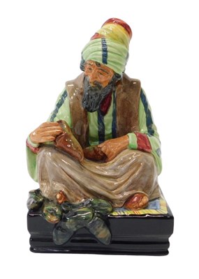 Lot 22 - A Royal Doulton figure modelled as...