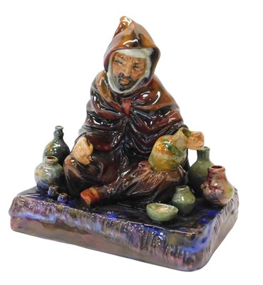 Lot 24 - A Royal Doulton figure modelled as The...