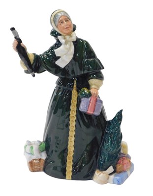 Lot 302 - A Royal Doulton figure modelled as Christmas...