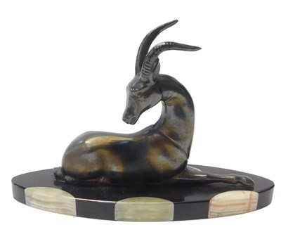 Lot 319 - An Art Deco cast metal figure modelled as a...