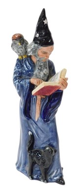 Lot 414 - A Royal Doulton figure modelled as The...