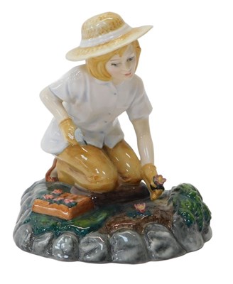 Lot 420 - A Royal Doulton figure modelled as Gardening...
