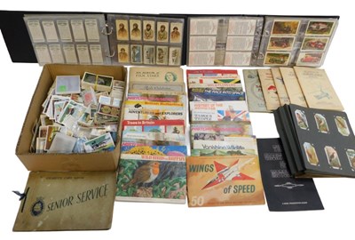 Lot 356 - A group of albums and folders containing...