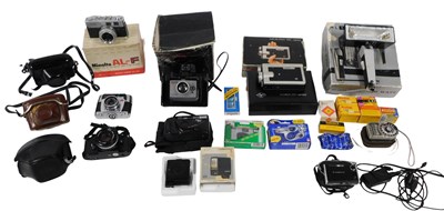 Lot 403 - A group of cameras and related optical...