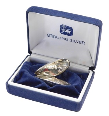 Lot 169 - An Elizabeth II silver mussel eater, formed as...
