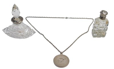 Lot 455 - Two cut glass and silver mounted scent bottles,...