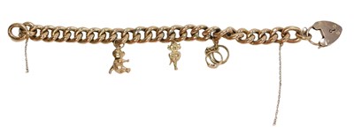 Lot 43 - A curb link charm bracelet, set with three...