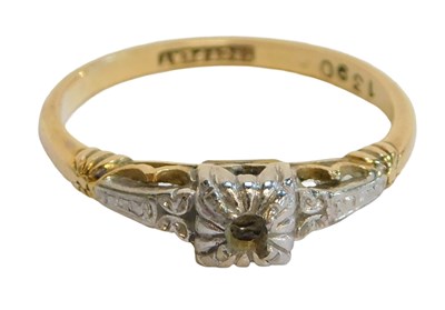 Lot 94 - A dress ring, the central scroll panel in...