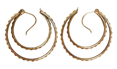 Lot 97 - A pair of hoop earrings, each of two hoop...