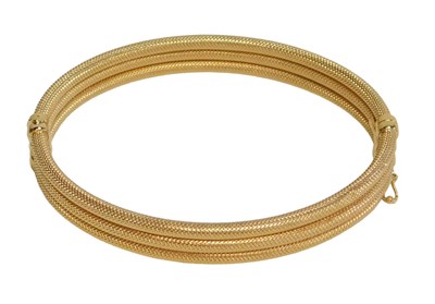 Lot 45 - An Eastern inspired three bar bracelet, with...