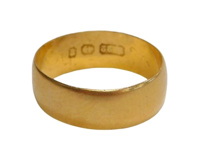 Lot 228 - A 22ct gold wedding band, of plain design, 7mm...