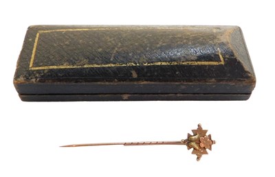 Lot 241 - An early 20thC stick pin, the cross top with...