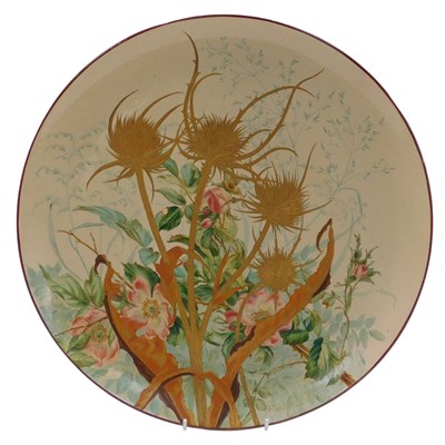 Lot 558 - A late 19thC pottery charger, decorated with...