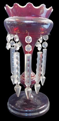 Lot 559 - A Victorian ruby glass lustre, with part gilt...