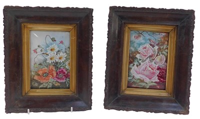 Lot 562 - A pair of 20thC floral porcelain plaques, each...