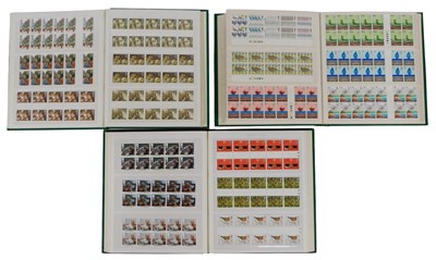 Lot 599 - Three albums containing Elizabeth II stamp...